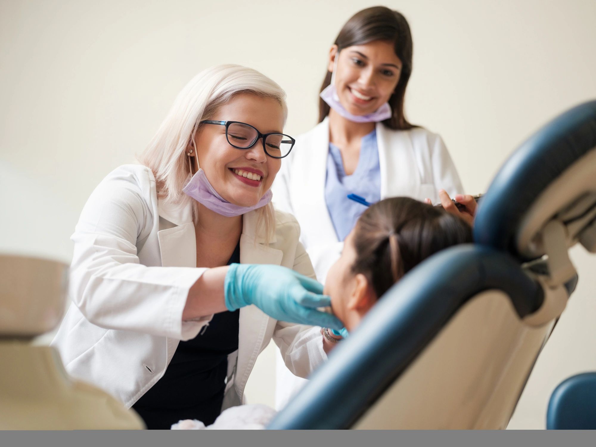 Dentist consulting with a patient in a modern dental clinic